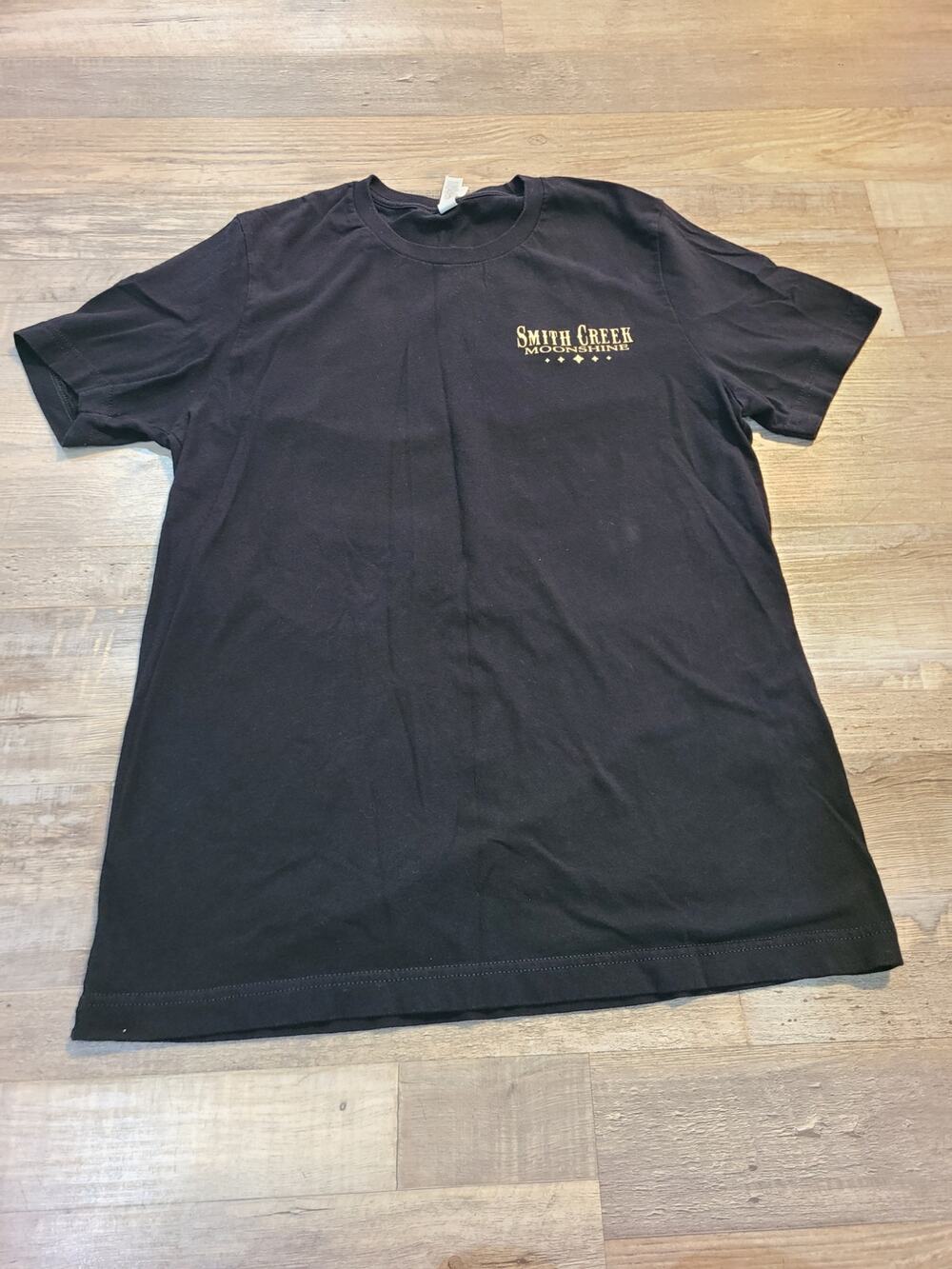 Bella Canvas Large women's black smith creek moonshine tee